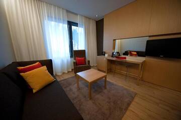 Фото номера Стандартный двухместный номер с 2 отдельными кроватями Отель Hotel Levi Panorama &amp; Levi Chalets г. Леви 7