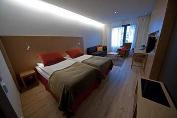 Фото номера Стандартный двухместный номер с 2 отдельными кроватями Отель Hotel Levi Panorama &amp; Levi Chalets г. Леви 8