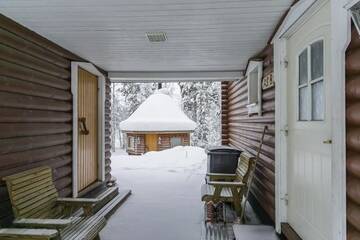 Фото номера Шале с 3 спальнями Дома для отпуска Mökki Ketunlenkki г. Леви 11