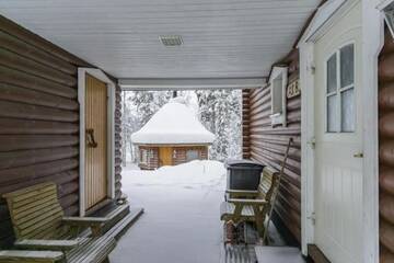 Фото номера Шале с 3 спальнями Дома для отпуска Mökki Ketunlenkki г. Леви 14