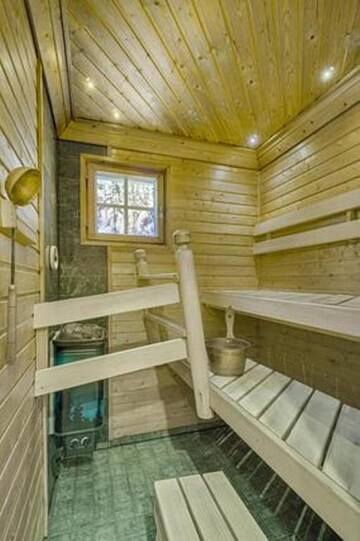 Фото номера Шале с 3 спальнями Дома для отпуска Mökki Ketunlenkki г. Леви 19